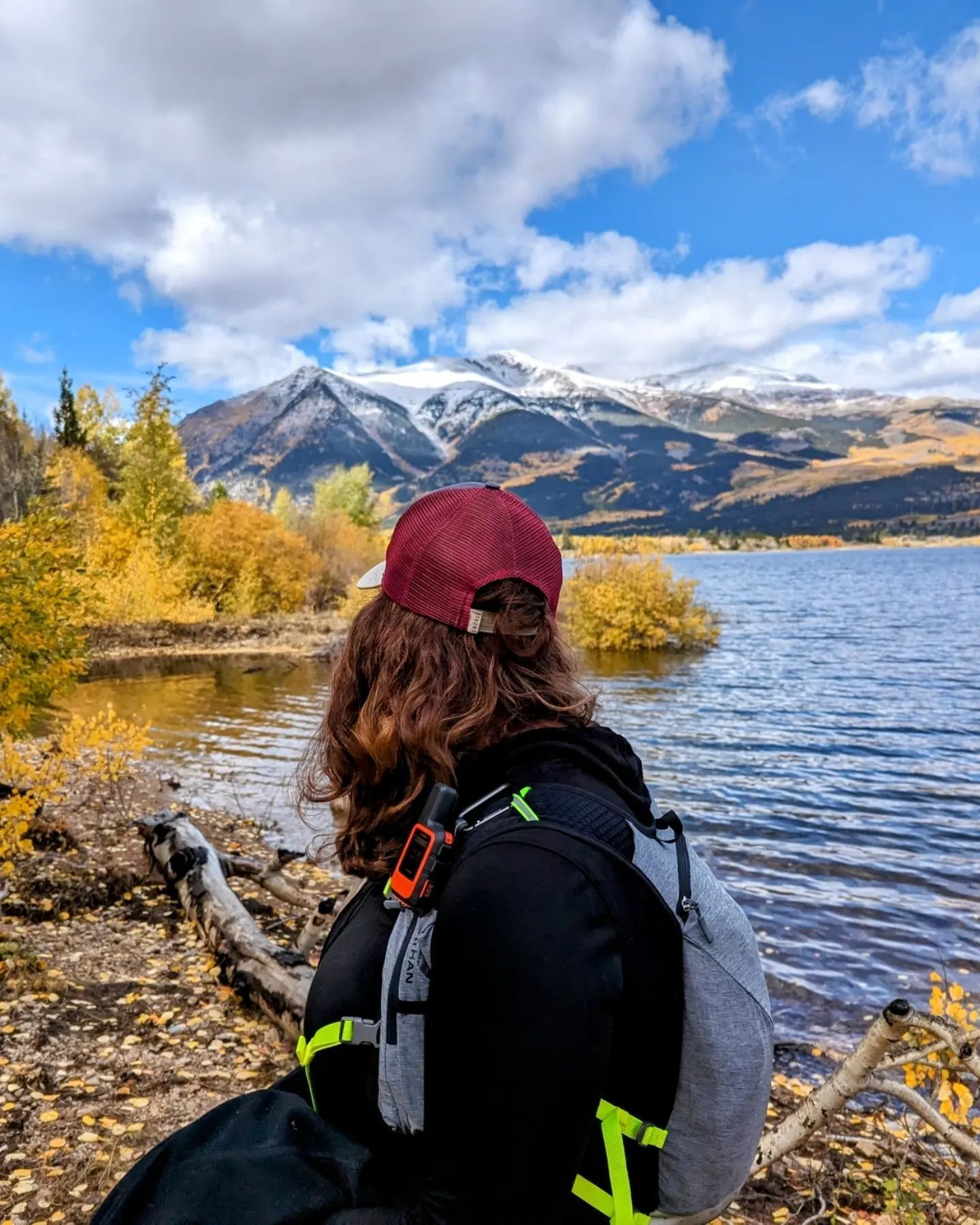 Woman looking at golden aspen, Twin Lakes and Mt. Elbert by @thismomentarylightaffliction